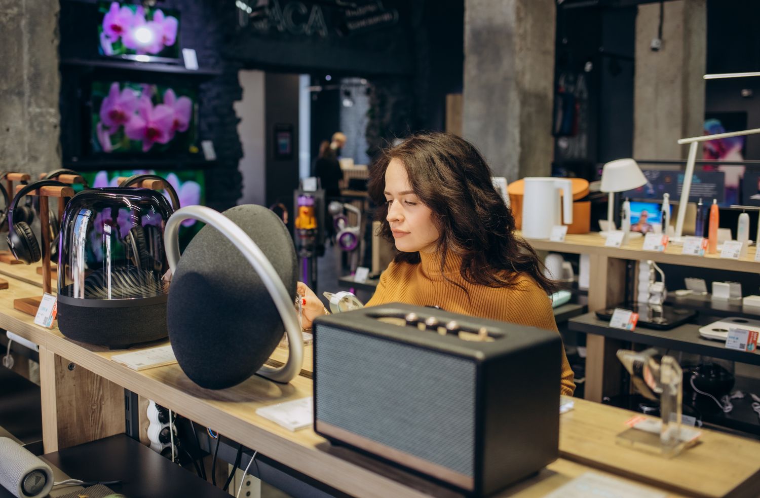 woman in electronics store